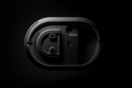 A close-up of a gray, oval Pro Series part by Industrial Designer Simon Busse Studio for ABUS Smart Vest Pro security products. 